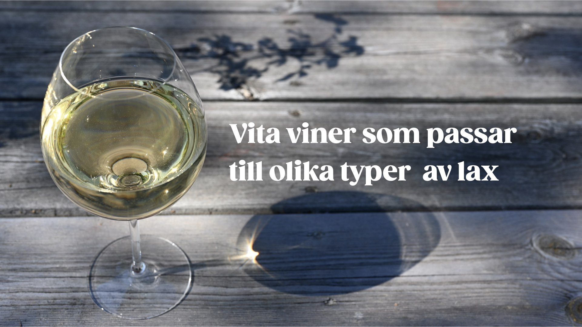 Ett glas med vitt vin